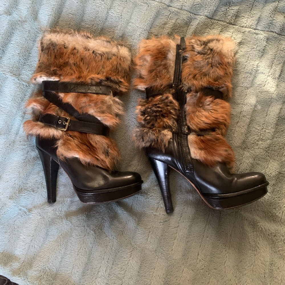 Ugg boots w/ sheepskin lining and 100% fox hair.